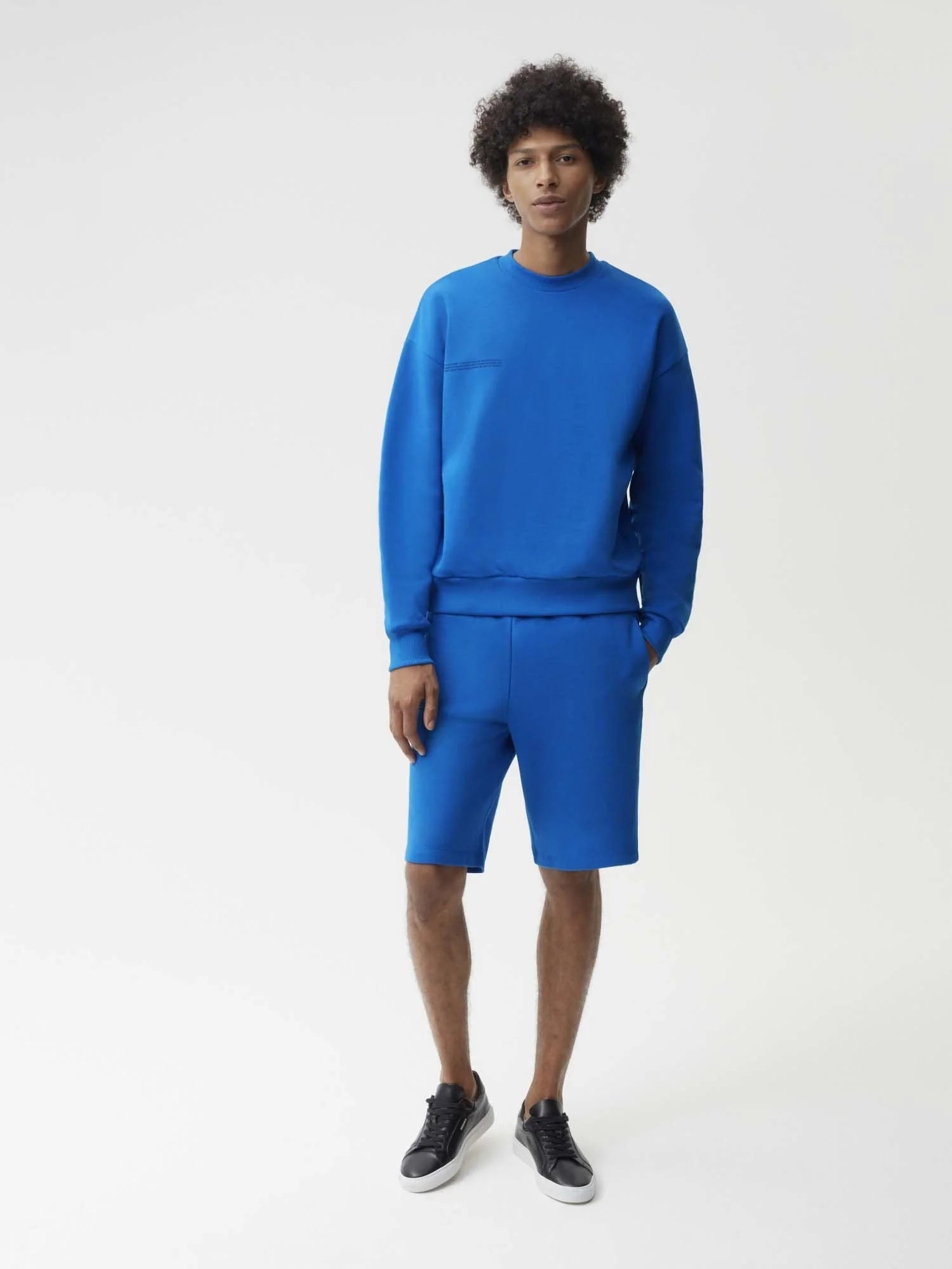 Blue shorts and jumper Male
