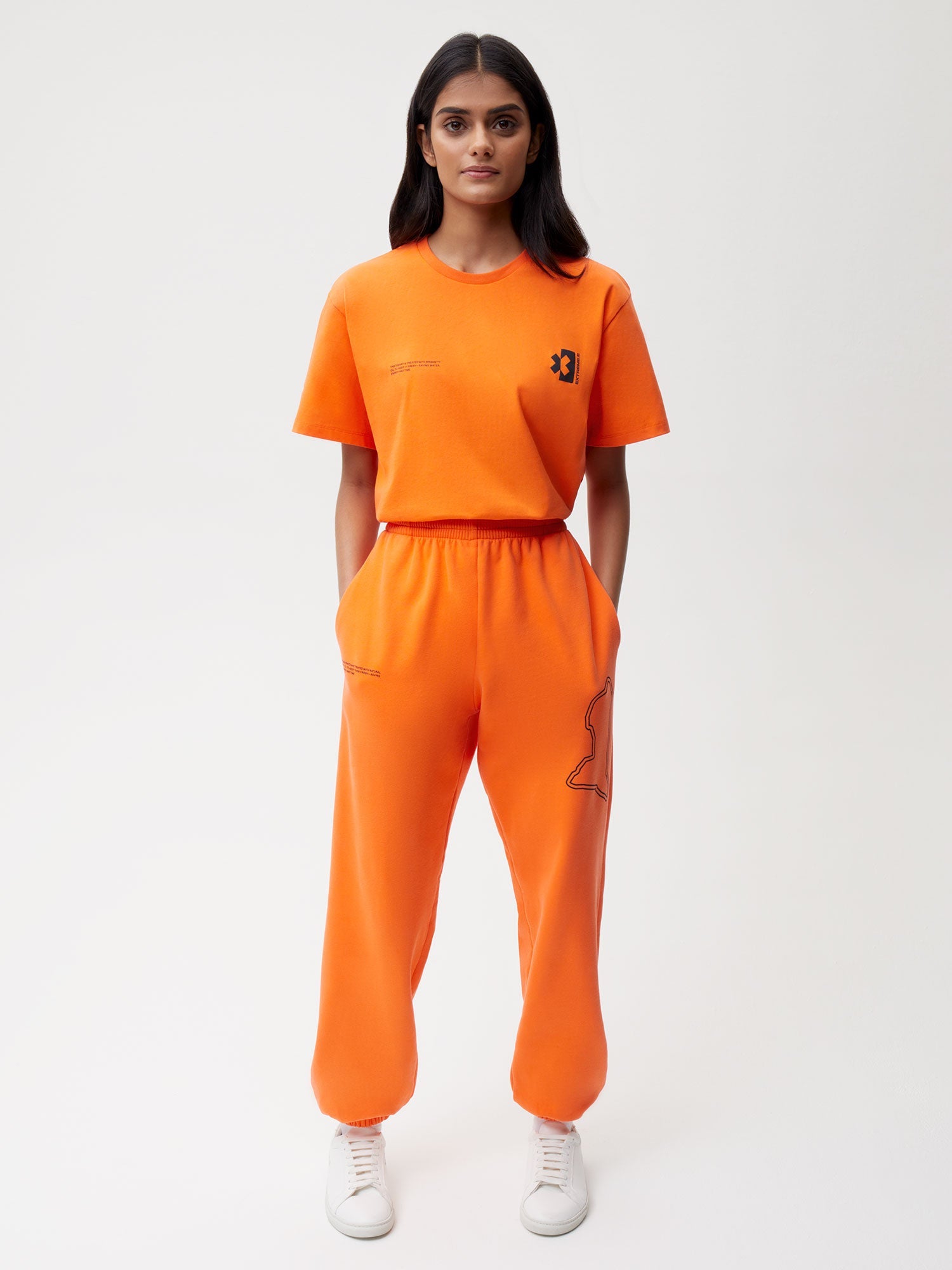 PANGAIA x Extreme-E Track Pants—persimmon orange female