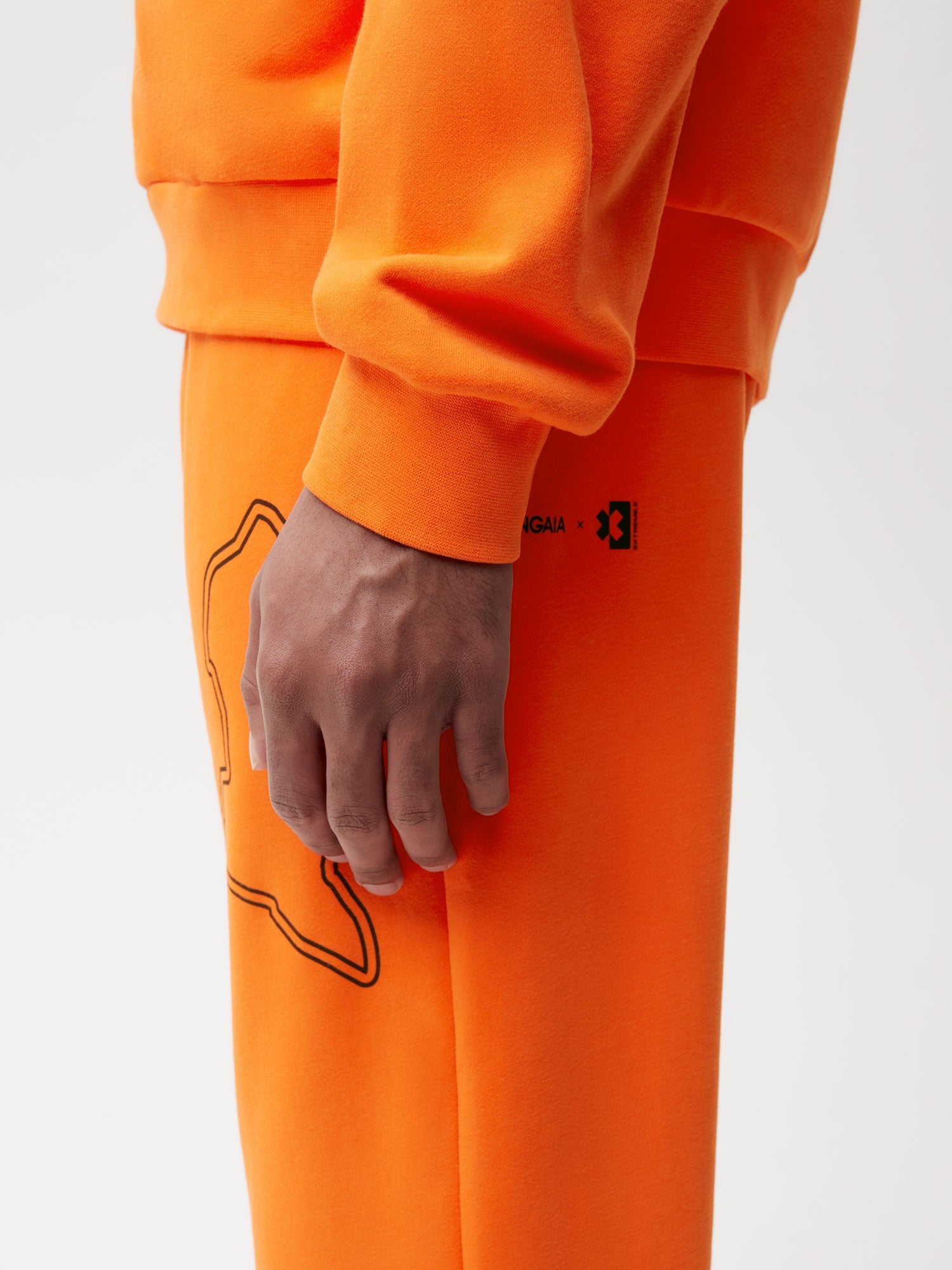 PANGAIA x Extreme-E Track Pants—persimmon orange male