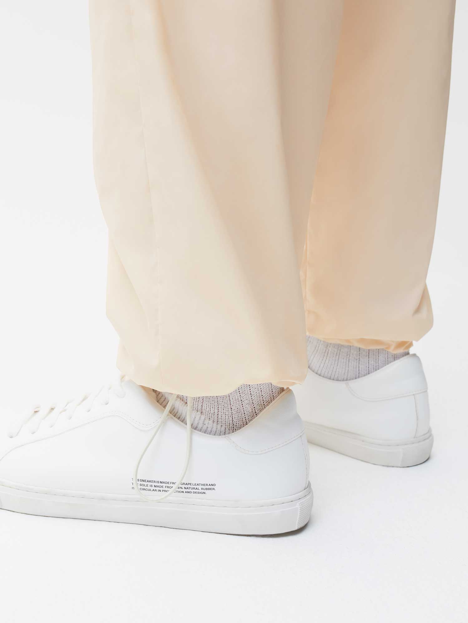 Recycled Nylon Track Pants—sand male